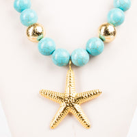 Κολιέ με χρυσό αστερία και τιρκουάζ χάντρες