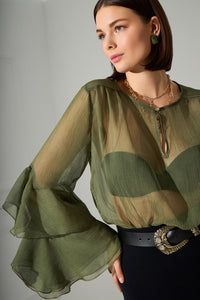 Διάφανη μπλούζα με βολάν