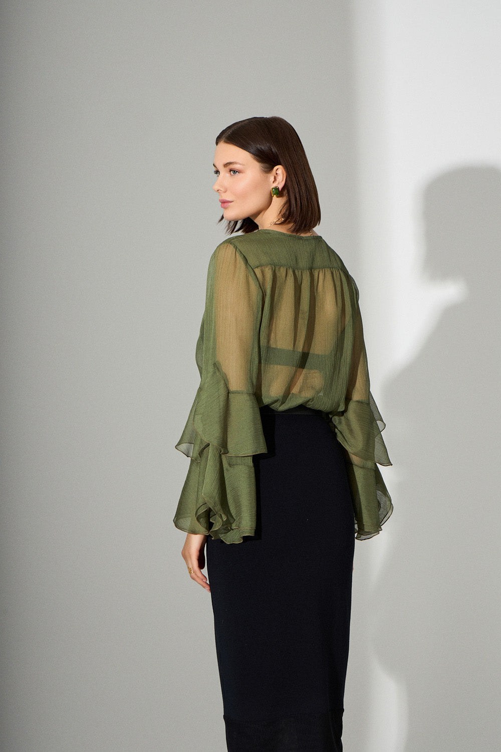 Διάφανη μπλούζα με βολάν