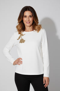 Λευκή μπλούζα με χρυσό διακοσμητικό μοτίβο από την Ellisargi Boutique