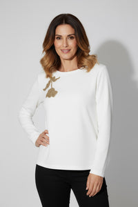 Λευκή μπλούζα με χρυσό διακοσμητικό μοτίβο από την Ellisargi Boutique