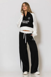 Μαύρο φούτερ παντελόνι με λευκή ρίγα και logo