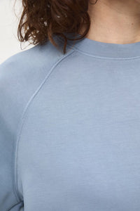 Γυναικείο γαλάζιο sweatshirt t-shirt σε relaxed γραμμή με κοντά raglan μανίκια