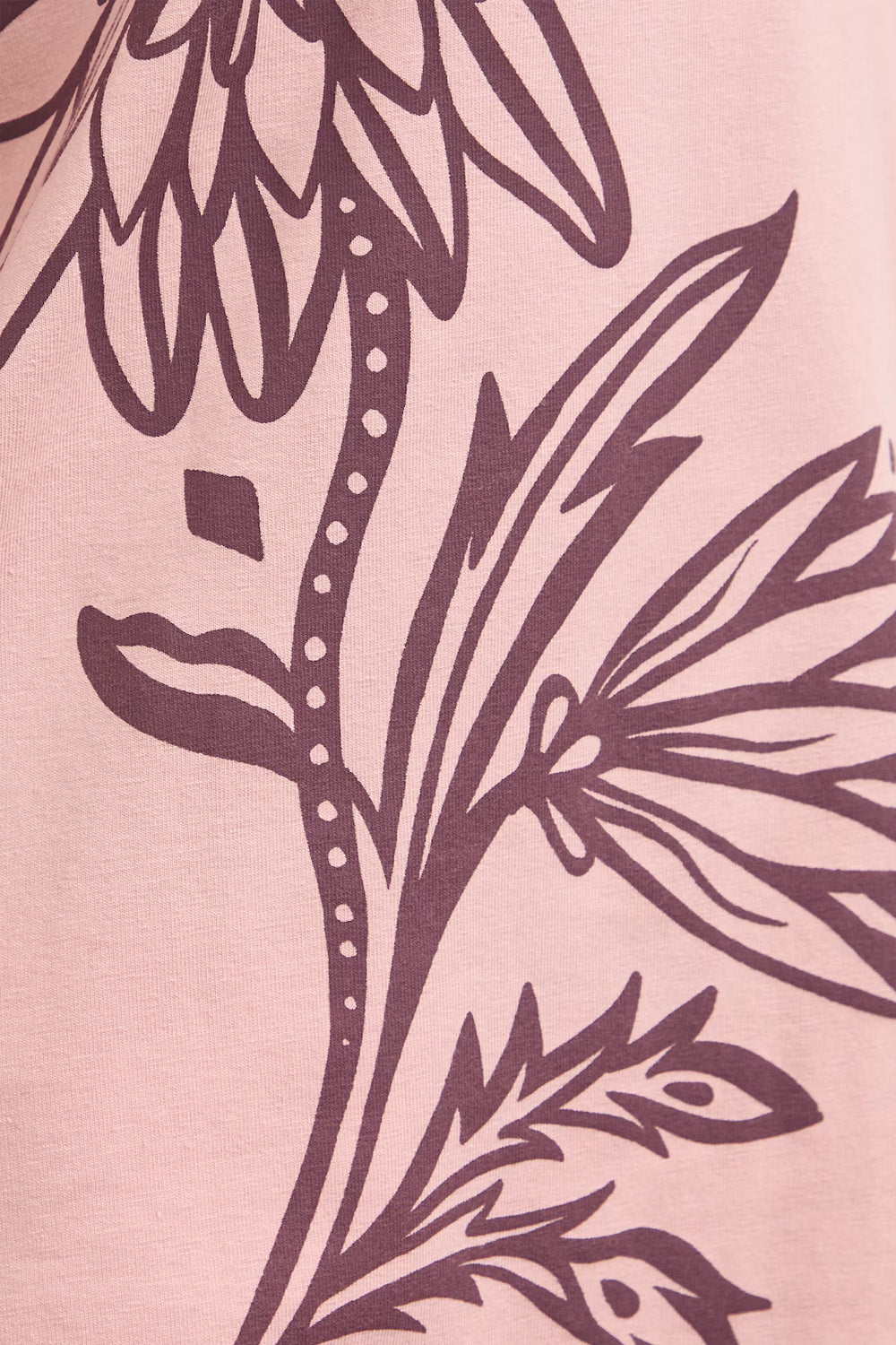 Γυναικείο oversize ροζ t-shirt με floral print, V ντεκολτέ και φαρδιά κοντά μανίκια