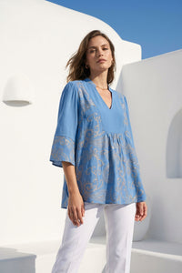 Γυναικεία μπλούζα σιέλ με λαχούρια και V λαιμόκοψη, αέρινη γραμμή