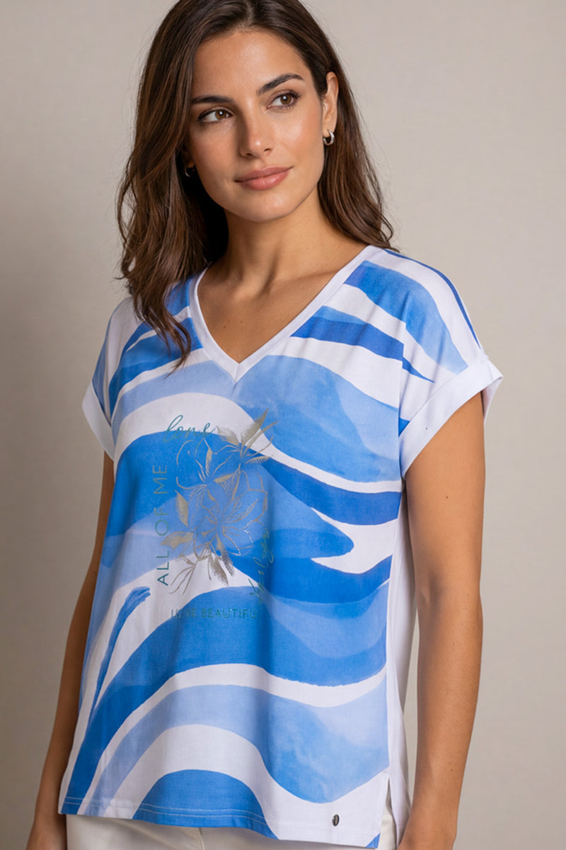 Γυναικεία μπλούζα με V λαιμόκοψη και μπλε abstract σχέδιο σε άνετη γραμμή