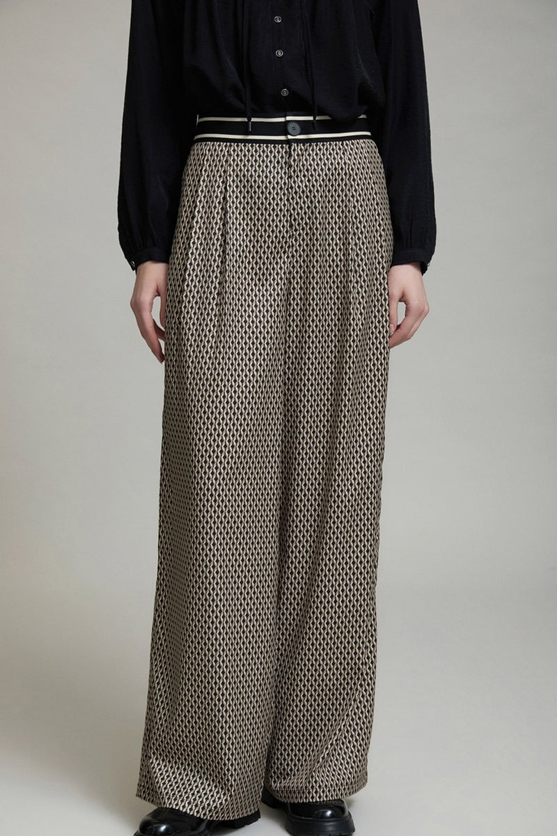 Εμπριμέ γυναικεία παντελόνα wide leg με γεωμετρικό μοτίβο και ριγέ μέση