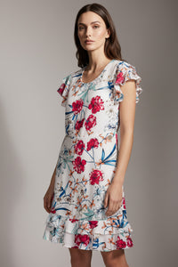 Εμπριμέ floral φόρεμα σε λευκή βάση με κόκκινα λουλούδια, κοντό μανίκι με βολάν και μήκος στο γόνατο.