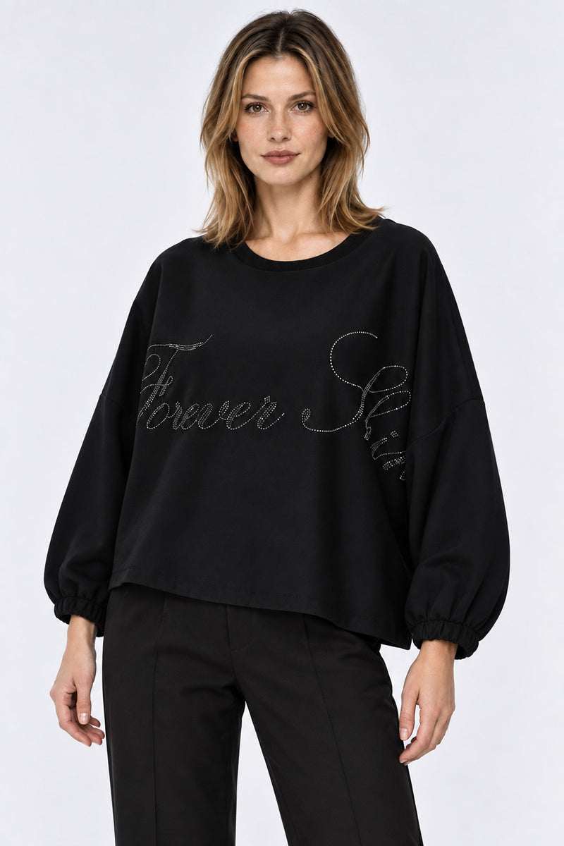 Γυναικεία μαύρη oversized μπλούζα Forever Shine με διακοσμητική γραφή από strass