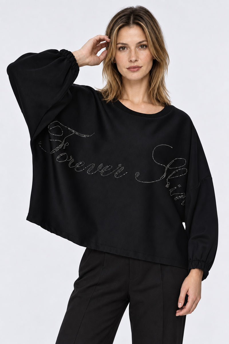 Γυναικεία μαύρη oversized μπλούζα Forever Shine με διακοσμητική γραφή από strass