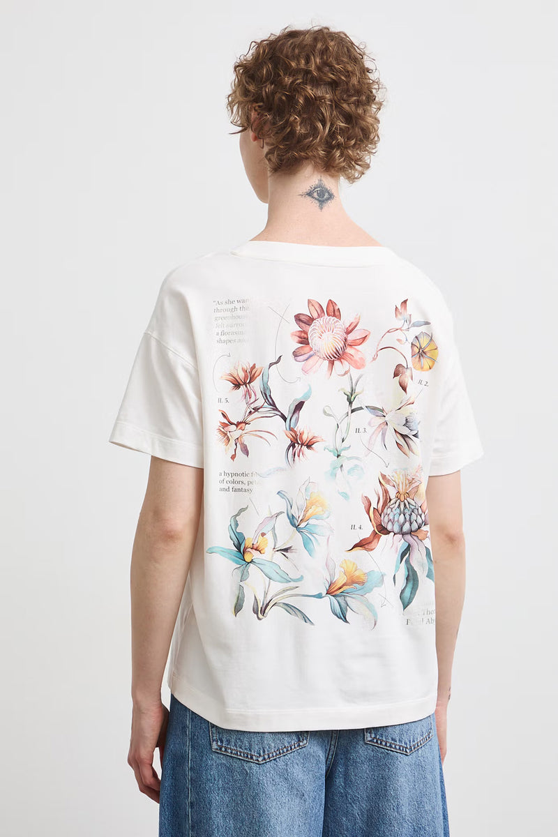 Γυναικεία Off White μπλούζα V-neck με κοντό μανίκι και πολύχρωμο floral print στην πλάτη.
