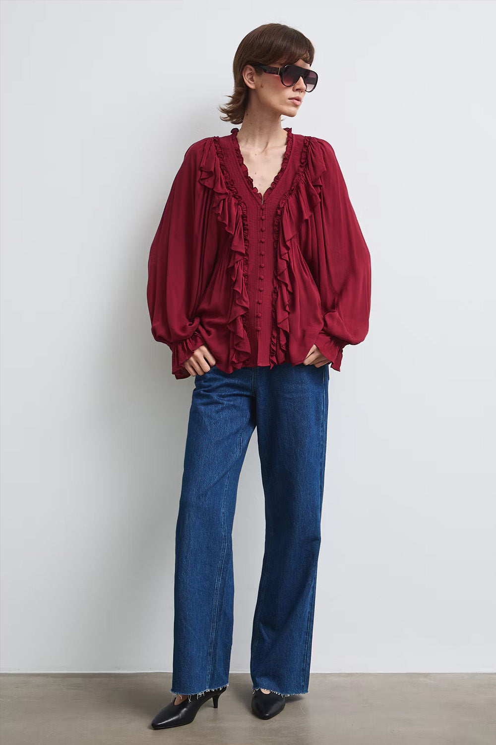Γυναικεία μπλούζα 100% βισκόζη σε burgundy με V λαιμόκοψη και βολάν.