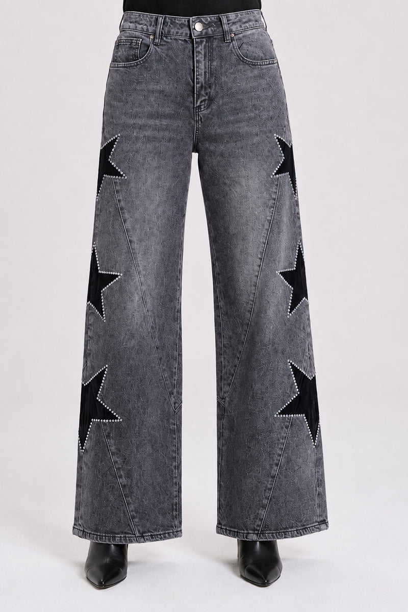 Γυναικείο γκρι wide leg jeans με μαύρα αστέρια και διακοσμητικές λεπτομέρειες strass.