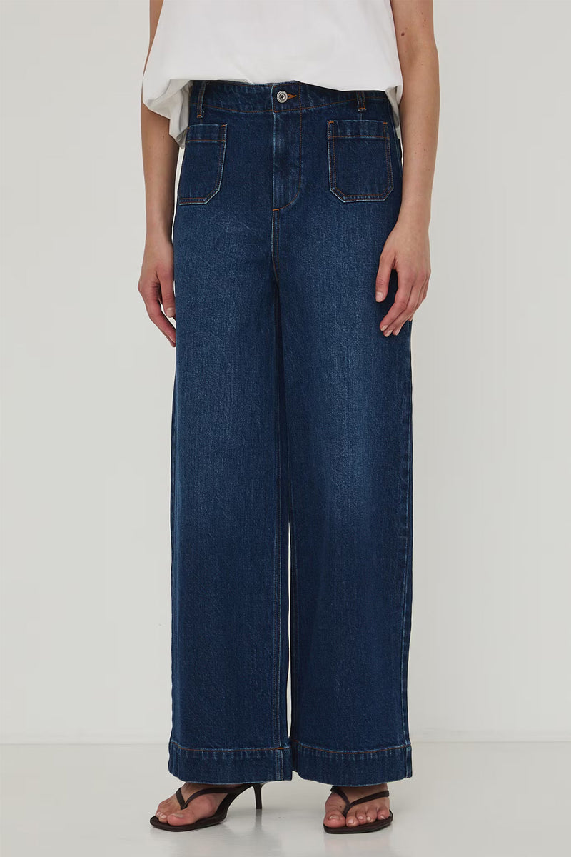 Γυναικείο dark blue wide leg τζιν παντελόνι με εξωτερικές τσέπες και εμφανή γαζιά