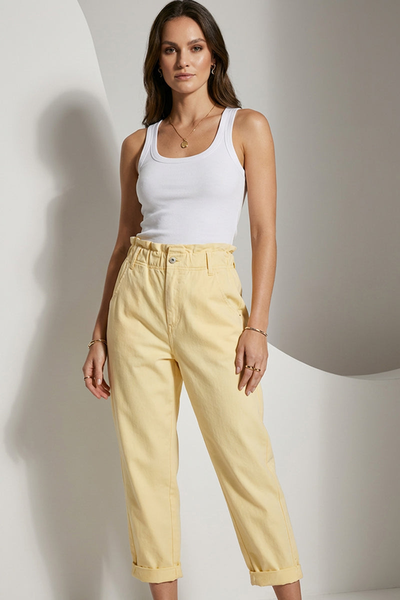 Κίτρινο γυναικείο παντελόνι με λάστιχο στη μέση και ρεβέρ στο τελείωμα