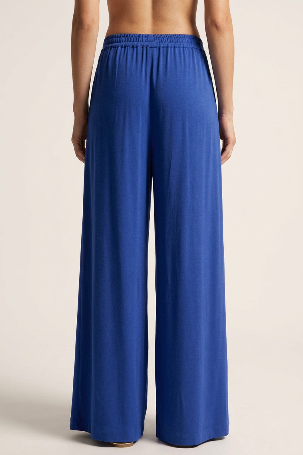Φαρδύ μπλε παντελόνι κρεπ μαροκέν με ελαστική μέση και πλεκτές λεπτομέρειες, μπροστινή και πίσω όψη