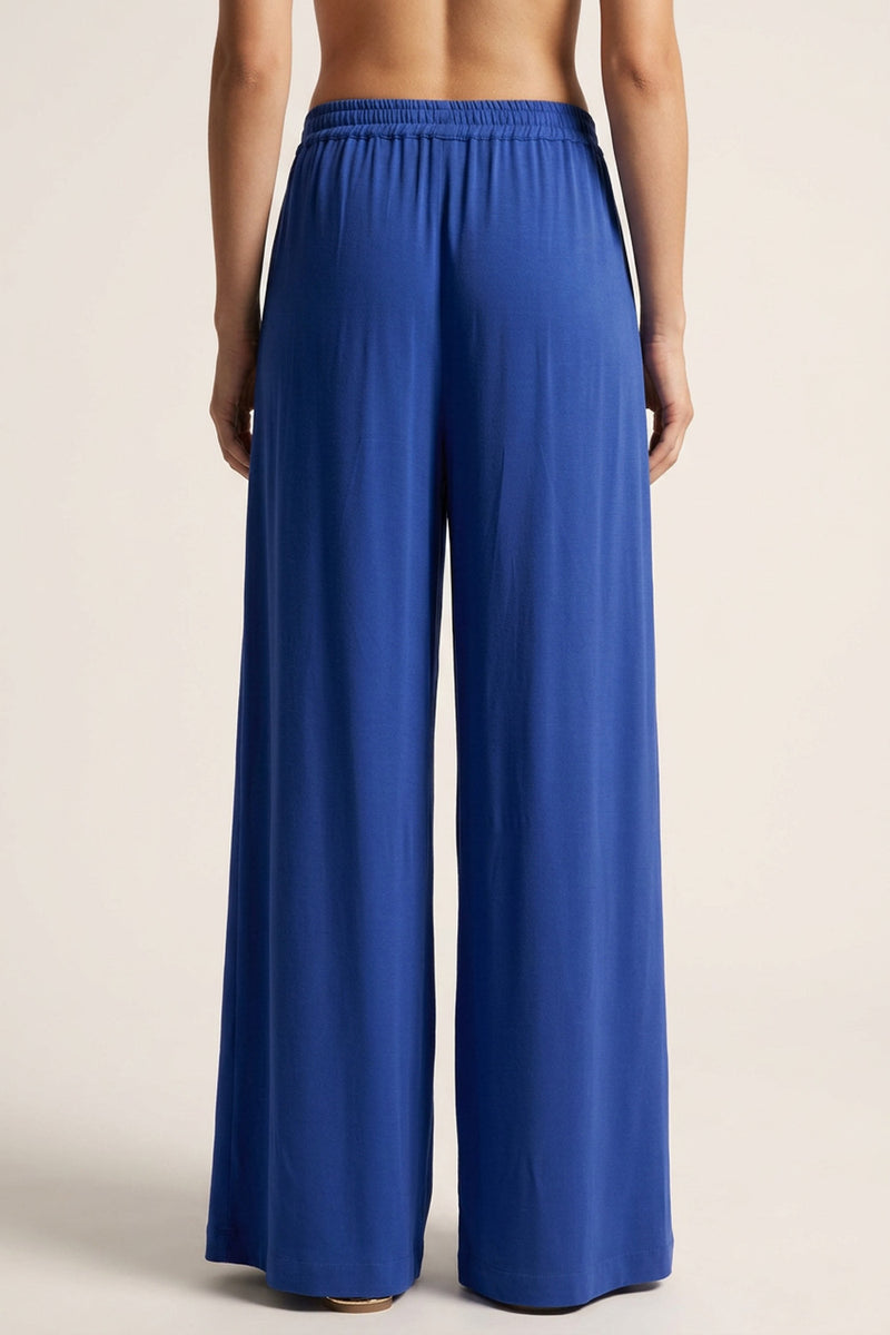 Φαρδύ μπλε παντελόνι κρεπ μαροκέν με ελαστική μέση και πλεκτές λεπτομέρειες, μπροστινή και πίσω όψη