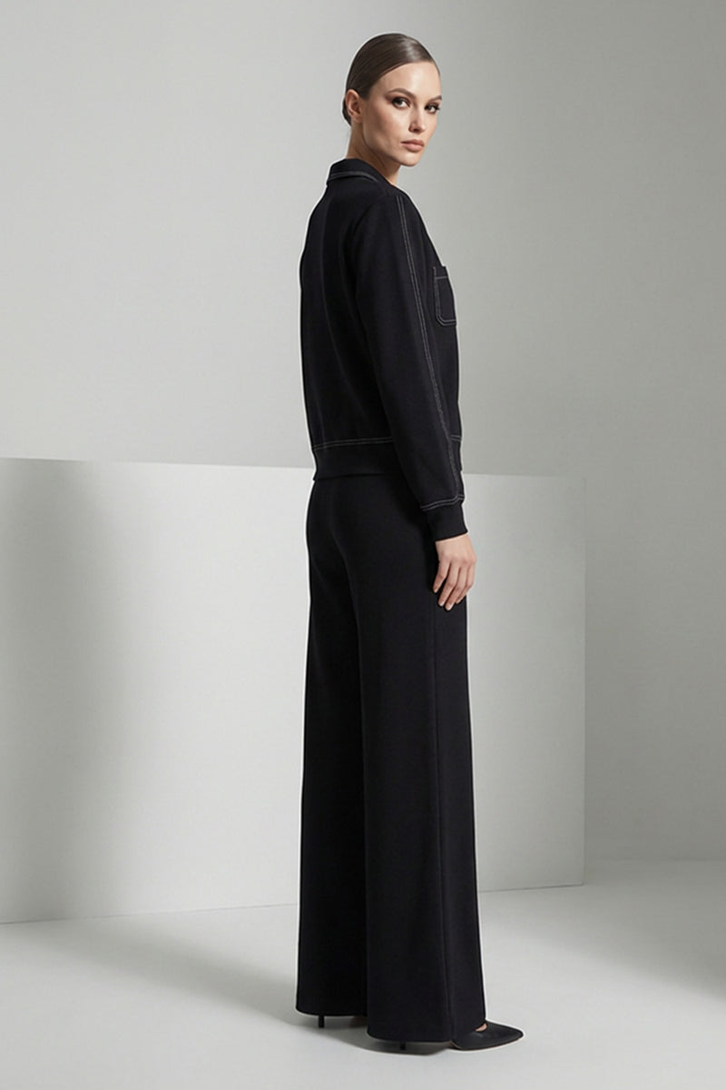 Mavro set me lefkes rafes me mplouza kai fardia pantelona se aneti grammi sto μοντέλο.