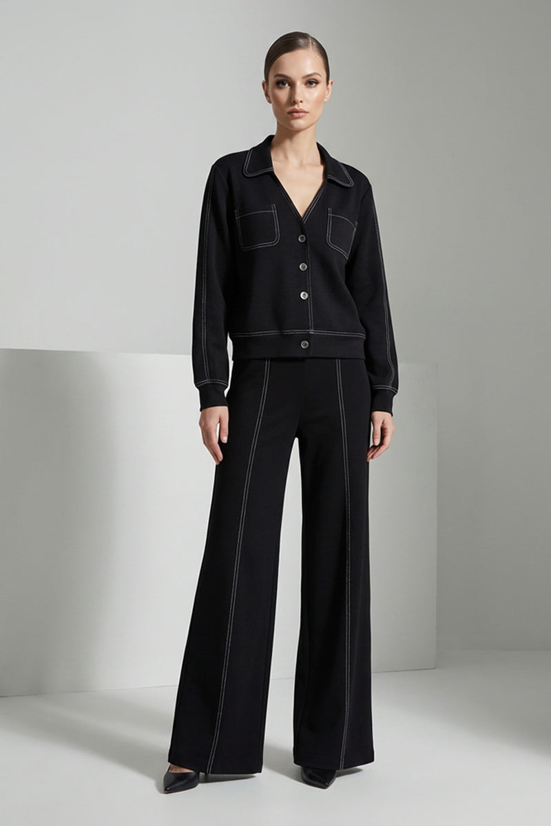 Mavro set me lefkes rafes me mplouza kai fardia pantelona se aneti grammi sto μοντέλο.