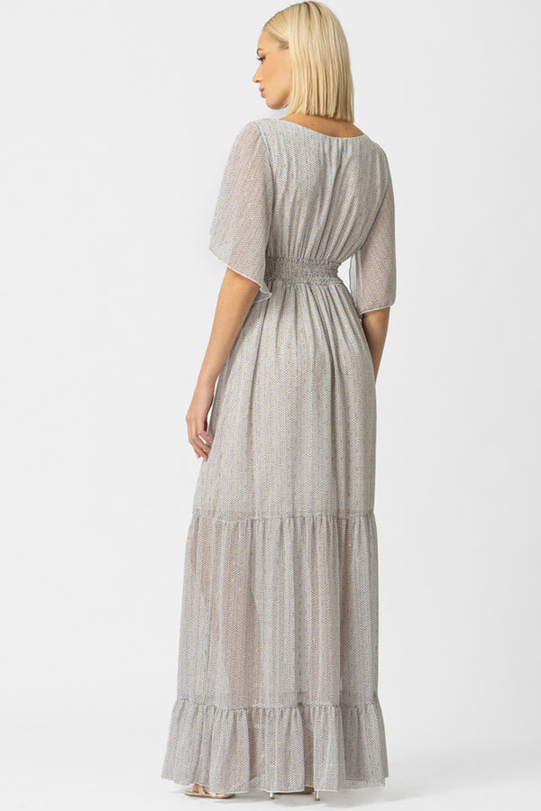 Γυναικείο maxi φόρεμα εκρού με μικρό print, δέσιμο στο λαιμό και βολάν στο τελείωμα