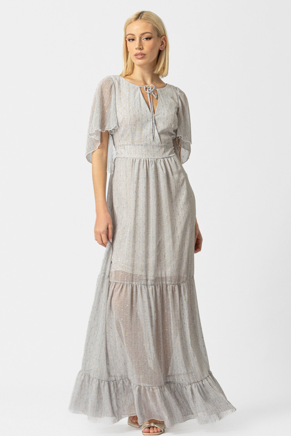 Γυναικείο maxi φόρεμα εκρού με μικρό print, δέσιμο στο λαιμό και βολάν στο τελείωμα