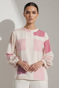 Γυναικεία εκρού μπλούζα με ροζ γεωμετρικό print και μακριά μανίκια