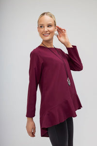 Oversized μπορντό μπλούζα με ασύμμετρο κόψιμο και βολάν στο τελείωμα – Ellisargi Boutique