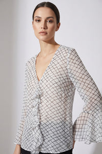 Γυναικεία μπλούζα με V λαιμόκοψη, καρό σχέδιο, βολάν μπροστά και μακριά καμπάνα μανίκια.