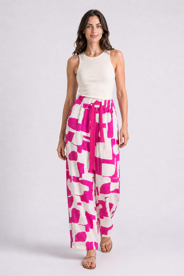 Γυναικεία παντελόνα Abstract Fuchsia σε εκρού και φούξια, με φαρδιά γραμμή, ελαστική μέση και υφασμάτινη ζώνη.