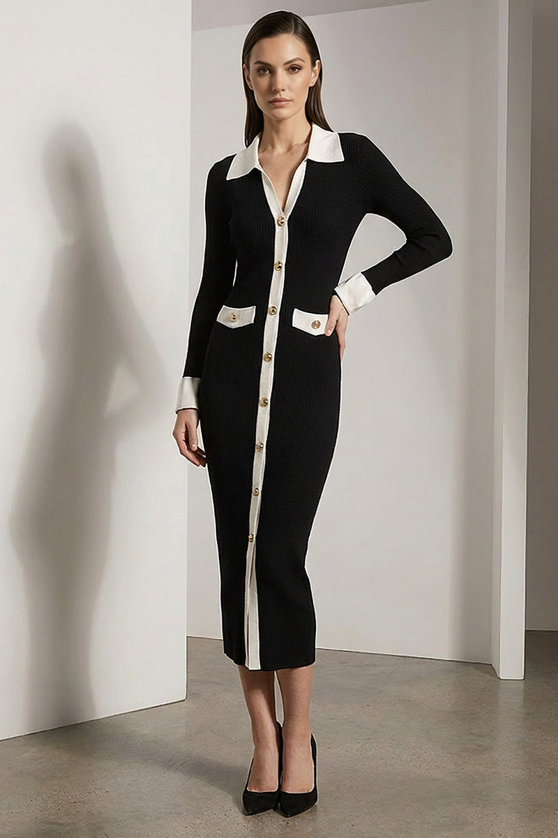 Μαύρο πλεκτό φόρεμα με λευκές λεπτομέρειες και χρυσά κουμπιά, φορεμένο από μοντέλο studio.