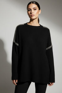 Μαύρο πλεκτό με ribbed υφή και λεπτομέρειες από στρασάκια στους ώμους
