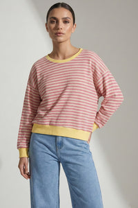 Ριγέ μπλούζα ροζ εκρού με κίτρινο ριμπ σε λαιμό και μανσέτες, μακρυμάνικη, χαλαρή γραμμή.