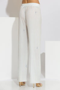 Γυναικεία εκρού σατέν παντελόνα με μπλε κάθετες ρίγες και φαρδιά γραμμή