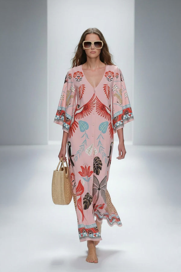Ροζ μάξι kaftan φόρεμα με tropical και ornamental print, V λαιμόκοψη και αέρινη εφαρμογή.