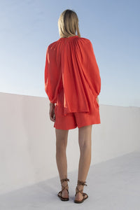 Σατέν μπλούζα κοραλλί με πλεκτές λεπτομέρειες πίσω όψη