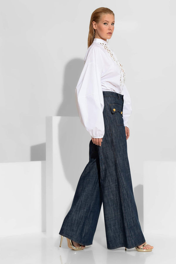 Σκούρα μπλε denim παντελόνα καμπάνα με χρυσά κουμπιά και ψηλόμεση γραμμή