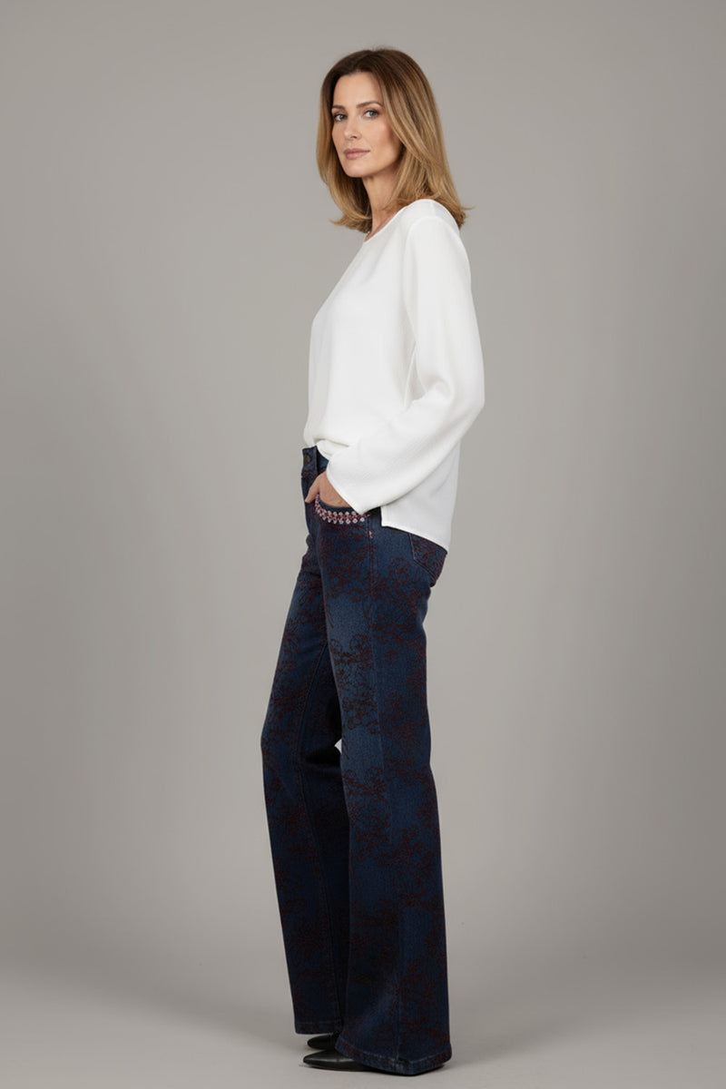 Τζιν καμπάνα μπλε με κεντημένο φλοράλ σχέδιο και strass στις τσέπες