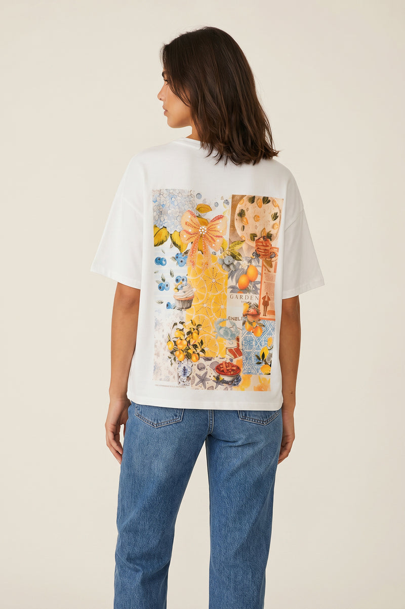 Γυναικείο λευκό oversized t-shirt με lemon collage print στην πλάτη και κίτρινο φιόγκο μπροστά.