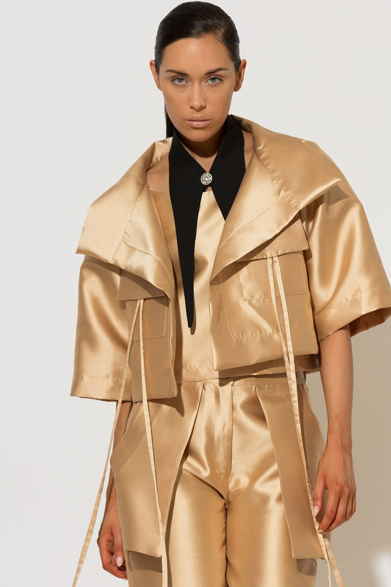 Γυναικείο χρυσό μπολερό σακάκι από ταφτά με oversized γιακά και cropped γραμμή