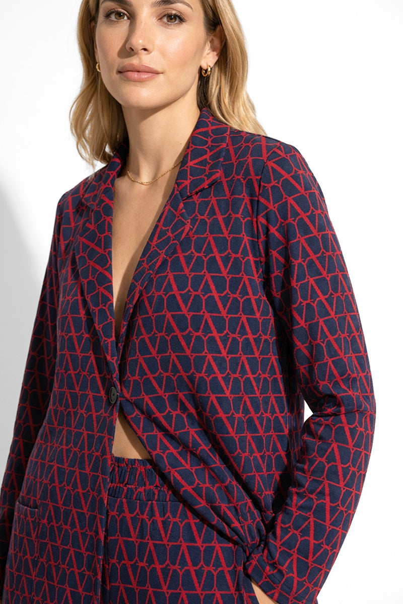 Λεπτομέρεια υφάσματος σε ζακέτα μπλε κόκκινο μοτίβο