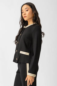 Μαύρη πλεκτή ζακέτα Jacky με εκρού ρέλι και χρυσά κουμπιά