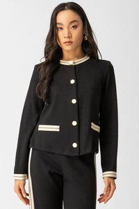 Μαύρη πλεκτή ζακέτα Jacky με εκρού ρέλι και χρυσά κουμπιά